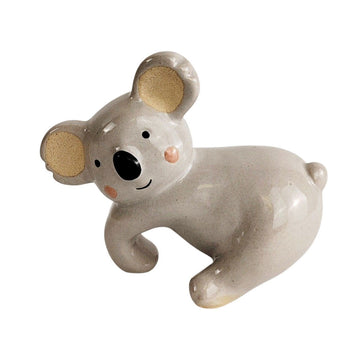 A ceramic koala designed to hang off the side of a pot.