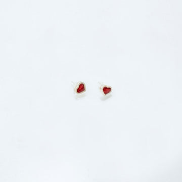 Heart-shaped earrings on a white background.