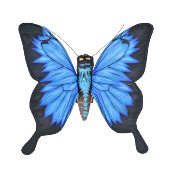 A butterfly shaped soft toy in blue and black.