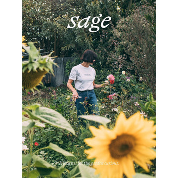 Book titled 'sage' about gardening with a person in a garden and sunflower in the foreground.