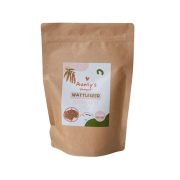 A brown packet with a sticker titled 'Aunty's Damper Wattleseed Playdough Mix'.