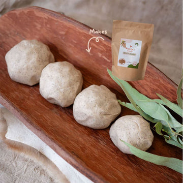 A brown packet with a sticker titled 'Aunty's Damper Wattleseed Playdough Mix'.