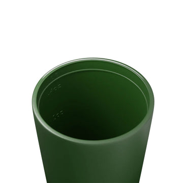 Green ceramic coffee cup with lid on a white background, branded 'made by Fressko'.