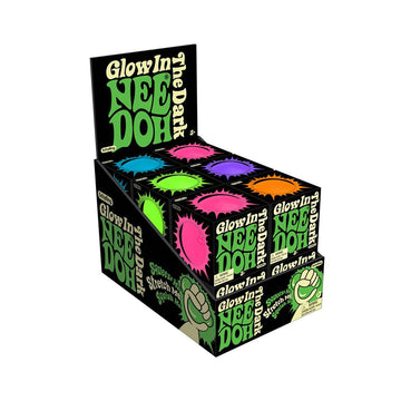 A stress ball inside a cube box with the text 'Need Doh Glow in the Dark on the side.