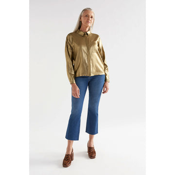 A gold metallic women's shirt with a matching front pocket.