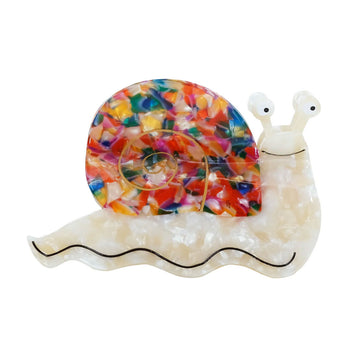 Colorful snail hair clip with a white body on a white background.