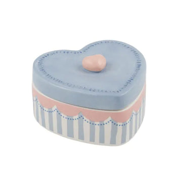 A ceramic box shaped like a heart in blue and pink.