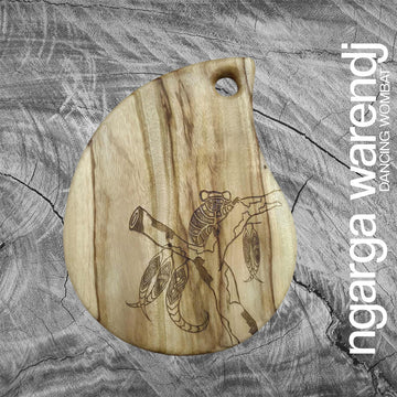 Wooden board with engraving of a koala on a textured gray background, featuring the brand 'ngarga warendj'.
