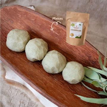 A brown packet with a sticker on the front with the text 'Aunty's Damper Strawberry Gum Playdough Mix'.