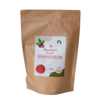 A brown packet with a sticker on the front with the text 'Aunty's Damper Davidson Plum Playdough Mix'.