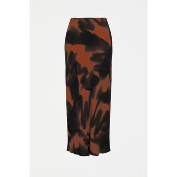 A women's skirt printed with a tortoise shell print in brown and black.