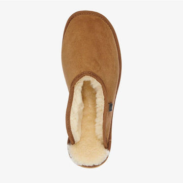 Light brown sheepskin slipper with a white sole on a light gray background.