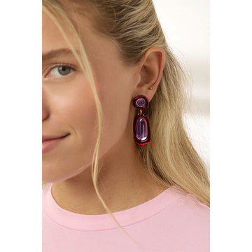 A pair of drop earrings in red and pink.
