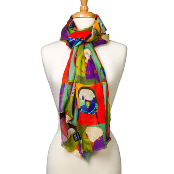 A woollen scarf printed with artwork of birds by Karen Barnes is wrapped around the neck of a mannequin.