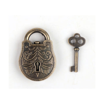 A box with an open front showing a lock and key inside and the heading 'Grecian Trick Lock' at the bottom.