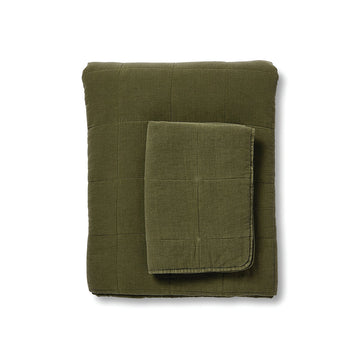 An olive green folded quilt cover set.