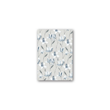 A rectangle magnet printed with magnolia blooms.
