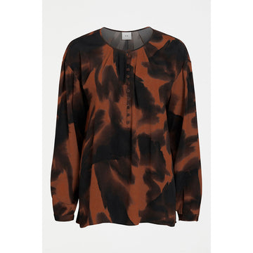 A women's shirt with a tortoise shell print.