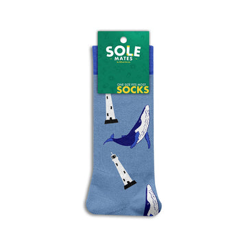 Blue socks with whale and lighthouse design on a white background.