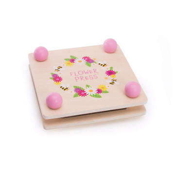 A square wooden flower press with a round border of flowers and bees on the top.