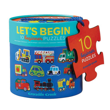 A round container titled 'Let's Begin' with an image of the 10 vehicle shaped puzzles inside.