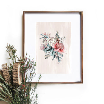 An A4 print of illustrated flowers in a gold frame with a small bouquet of flowers in front.