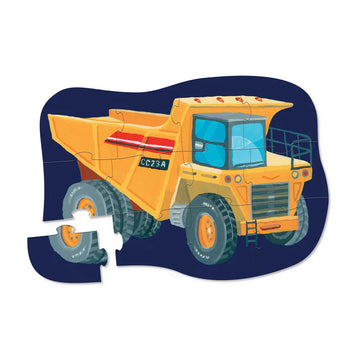 A puzzle box in dark blue with an illustration of a construction truck in yellow on the front.