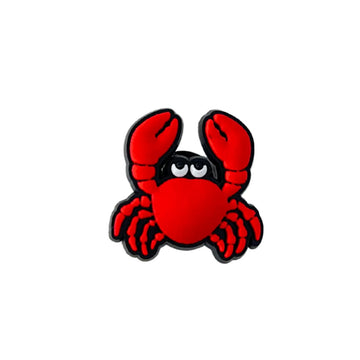 A crab shaped shoe charm in red PVC.