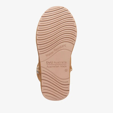 Tan sheepskin slipper boot on a white background.