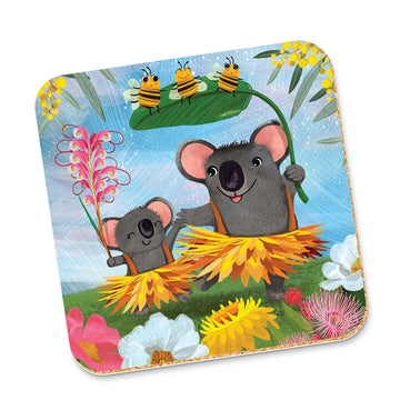A cork coaster with an illustration of two koalas wearing grass shirts surrounded by bees and flowers.