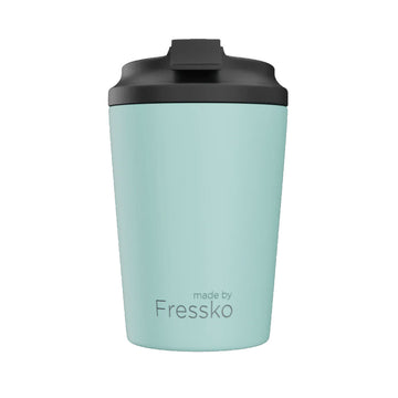 A ceramic reusable coffee cup in light blue with a black lid.