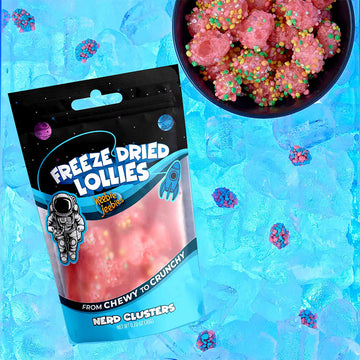 A packet of lollies with the heading 'Freeze Dried Lollies' next to a bowl of nerd cluster lollies.
