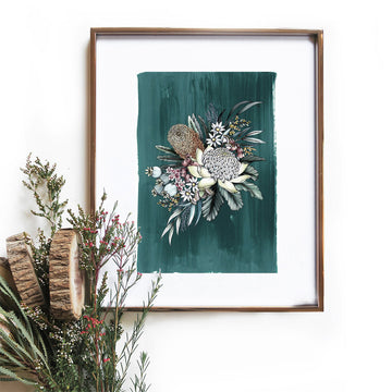 An illustration of native flowers on a teal background in a gold frame with a small bouquet in front.