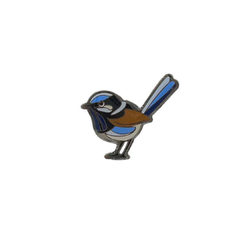 An enamel badge in the shape of a fairy wren.