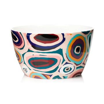 Colorful ceramic bowl with abstract pattern on a white background.