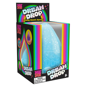 A tear drop shaped blue toy inside a clear box titled 'Dream Drop'.