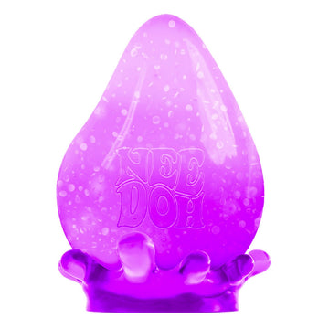 A tear drop shaped blue toy inside a clear box titled 'Dream Drop'.