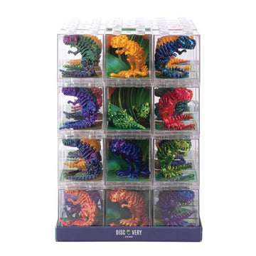 A set of 3D printed dinosaur toys in clear cube boxes.