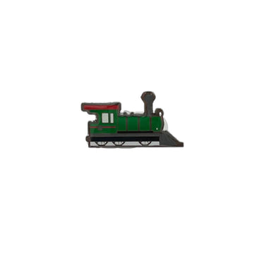 An enamel badge in the shape of a green train.