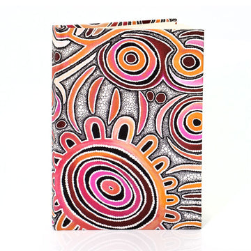 Notebook with a colorful abstract design on a white background.