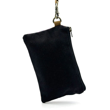 Colourful printed pouch with a black zip and wrist strap.