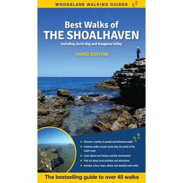 'Best Walks of the Shoalhaven' book cover featuring a photo of a person standing on a large rock at the beach surrounded by more rocks.