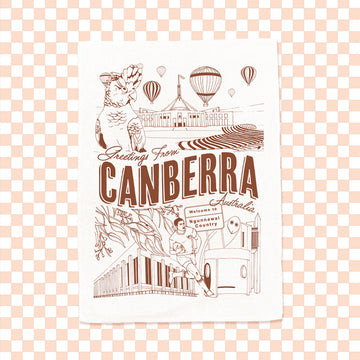 Illustrated tea towel with 'Greetings from Canberra, Australia' text and illustrations on a checkered background.