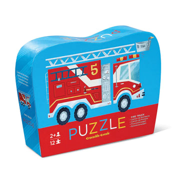 A puzzle box iilustrated with a red fire engine on a blue background.