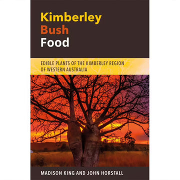 'Kimberley Bush Food' book cover featuring a photo of a tree without leaves with a strong sunset in the background.