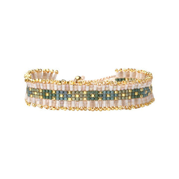 A thick beaded bracelet with green, beige and gold beads.