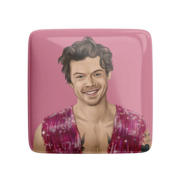 A square magnet illustrated with a portrait of Harry Styles.