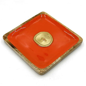 A wooden square tray with an orange inner and gold emblem on a white background.