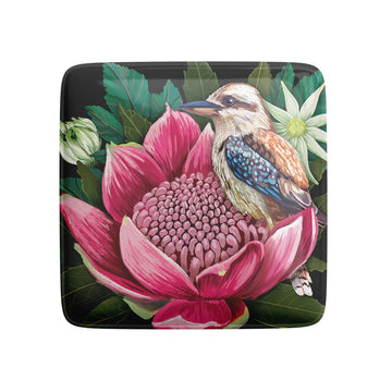A square coaster illustrated with a kookaburra sitting on a pink waratah flower.