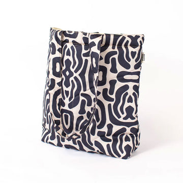 Patterned black and cream tote bag on a white background.